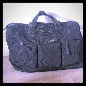 Adrienne Vittadini black travel/duffel bag.